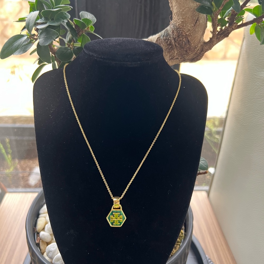 Tory Burch Gold Necklace with Hexagon Green Pendant.